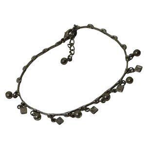 Silver Tone Charm Style Bracelet With Dangling Beads and Geometric Shapes